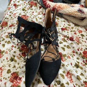 Black pointy flats with lace up and back zipper